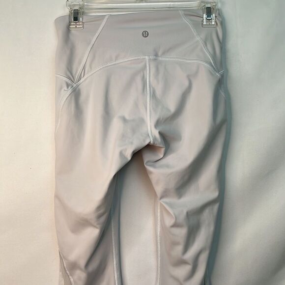 Lululemon Train Times White 7/8 length leggings with mesh accent. GUC size 6 - Picture 9 of 13